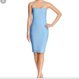 Likely blue strapless dress